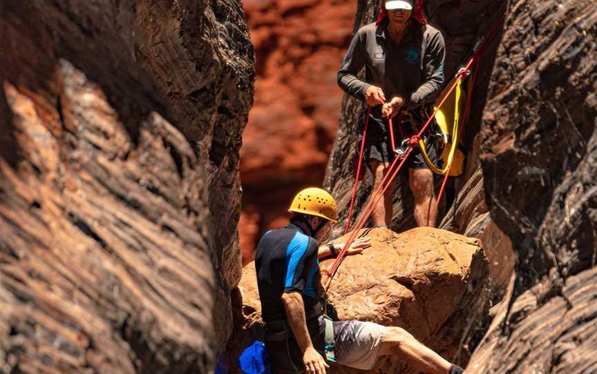 Knox Gorge, Karijini National Park, class 6 restricted canyoning tour. The lower onto the Natural Rock Slide.