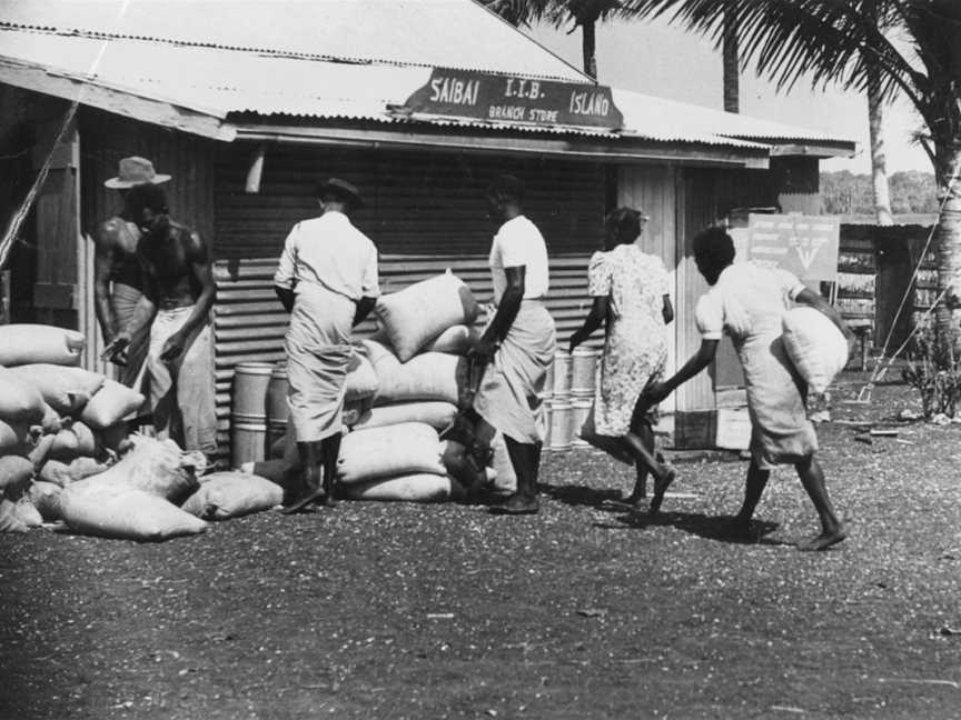 State Lib Qld2394325 Saibaiwomenhelpunloadproduceforthegeneralstoreon Saibai Island C1952