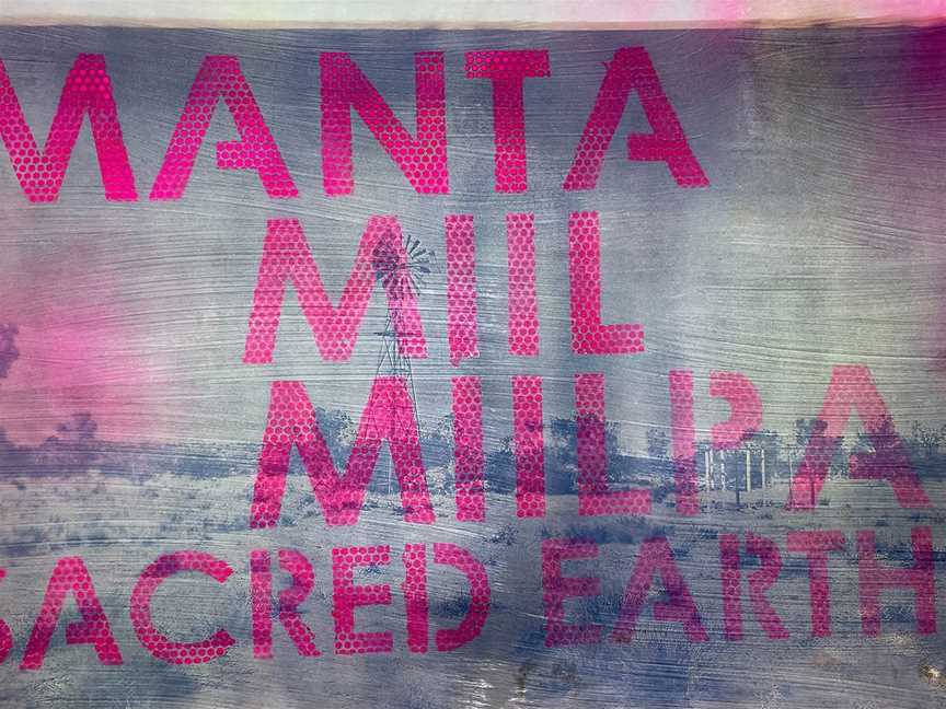 Robert Fielding, Manta Miilmiilpa [Sacred Earth], 2021, UV print on cotton rag with aerosol paint alteration, 111 x 76 cm. Courtesy of the artist and Mimili Maku Arts