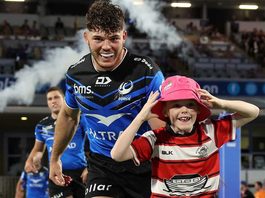 Western Force's Perth-born Wallaby Carlo Tizzano with a young fan