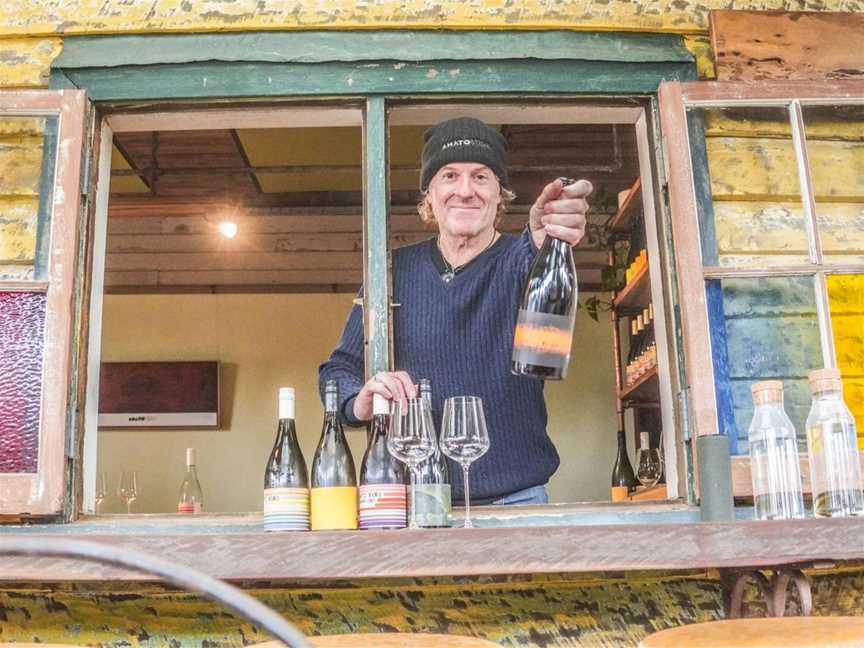 Winemaker Brad Wehr serving through the cellar door window